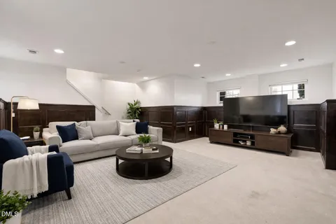 a front view of a building with parking