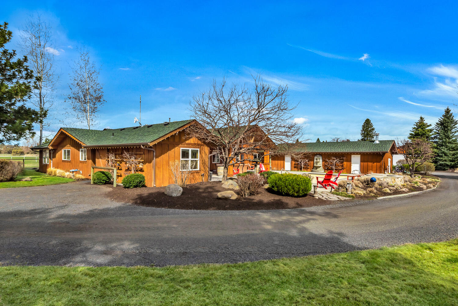 65260 Gerking Market Road Bend, OR 97703 - Photo 27 of 35 a front view of a house with garage