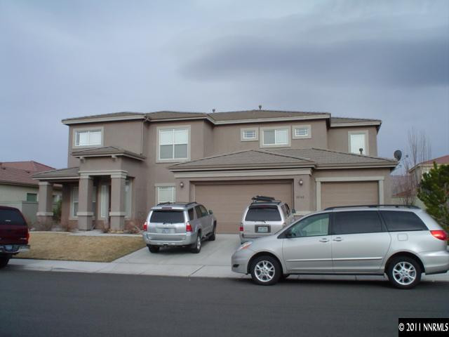 10140 Canyon Country Road Reno, NV 89521 - Photo 1 of 13 a car parked in front of a building