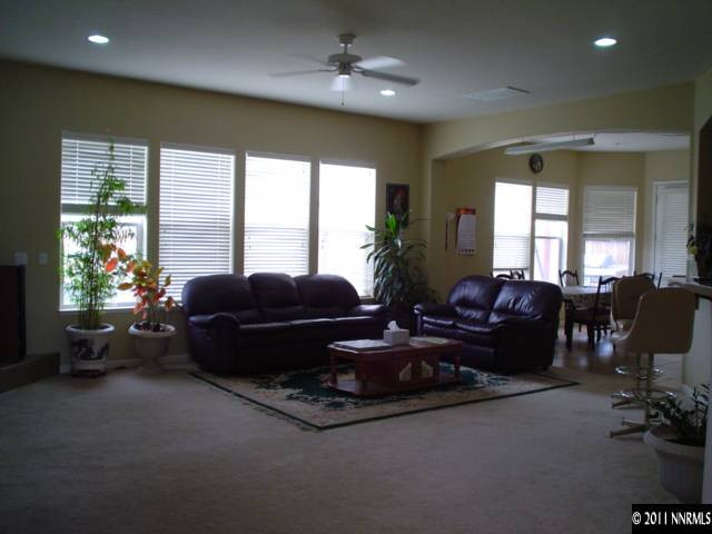 10140 Canyon Country Road Reno, NV 89521 - Photo 4 of 13 a living room with furniture and a large window