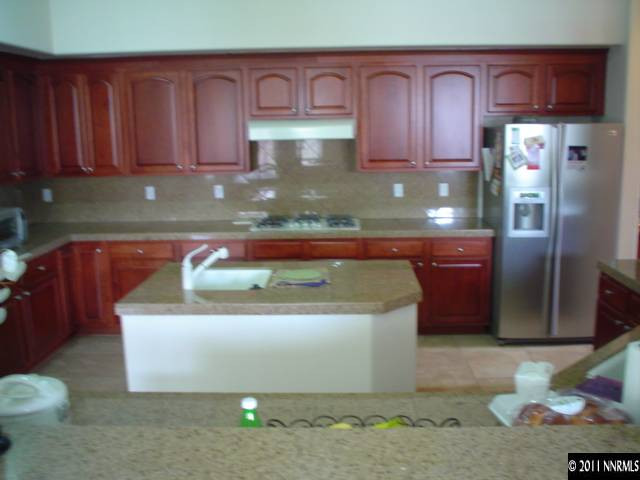 10140 Canyon Country Road Reno, NV 89521 - Photo 6 of 13 a close view of sink and cabinets