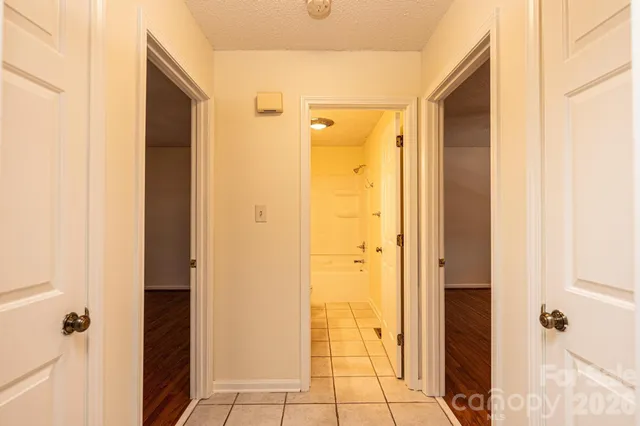 a bathroom with a shower and a sink
