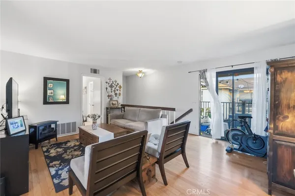 a view of a livingroom with furniture and a table