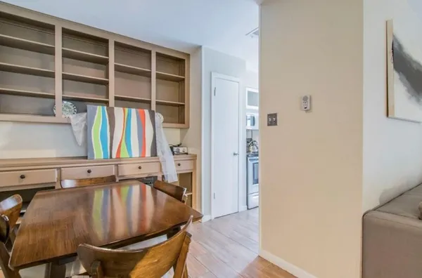 a view of a livingroom with furniture and door