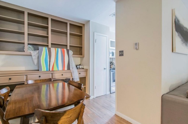 6903 Deatonhill Drive, Unit 22 Austin, TX 78745 - Photo 6 of 12 a view of a livingroom with furniture and door