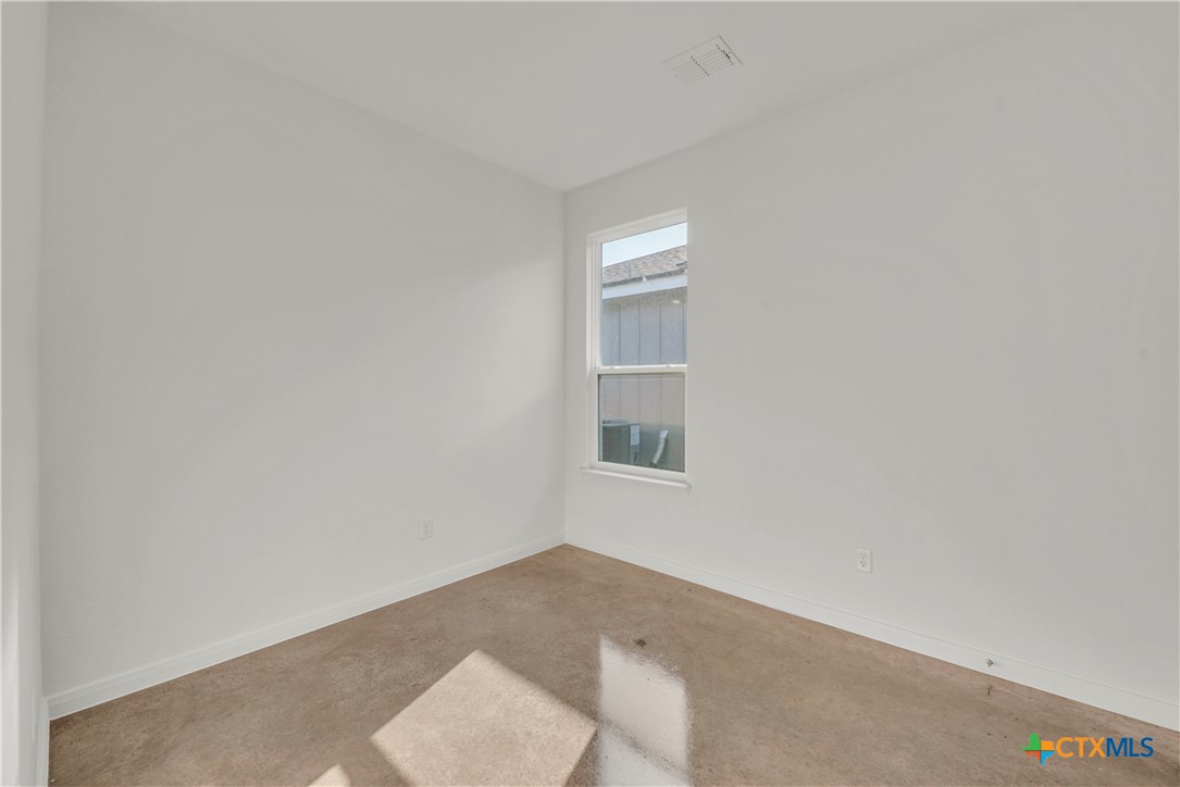 2906 Quail Rdg Lane Temple, TX 76501 - Photo 14 of 17 a view of a room that has a window in it