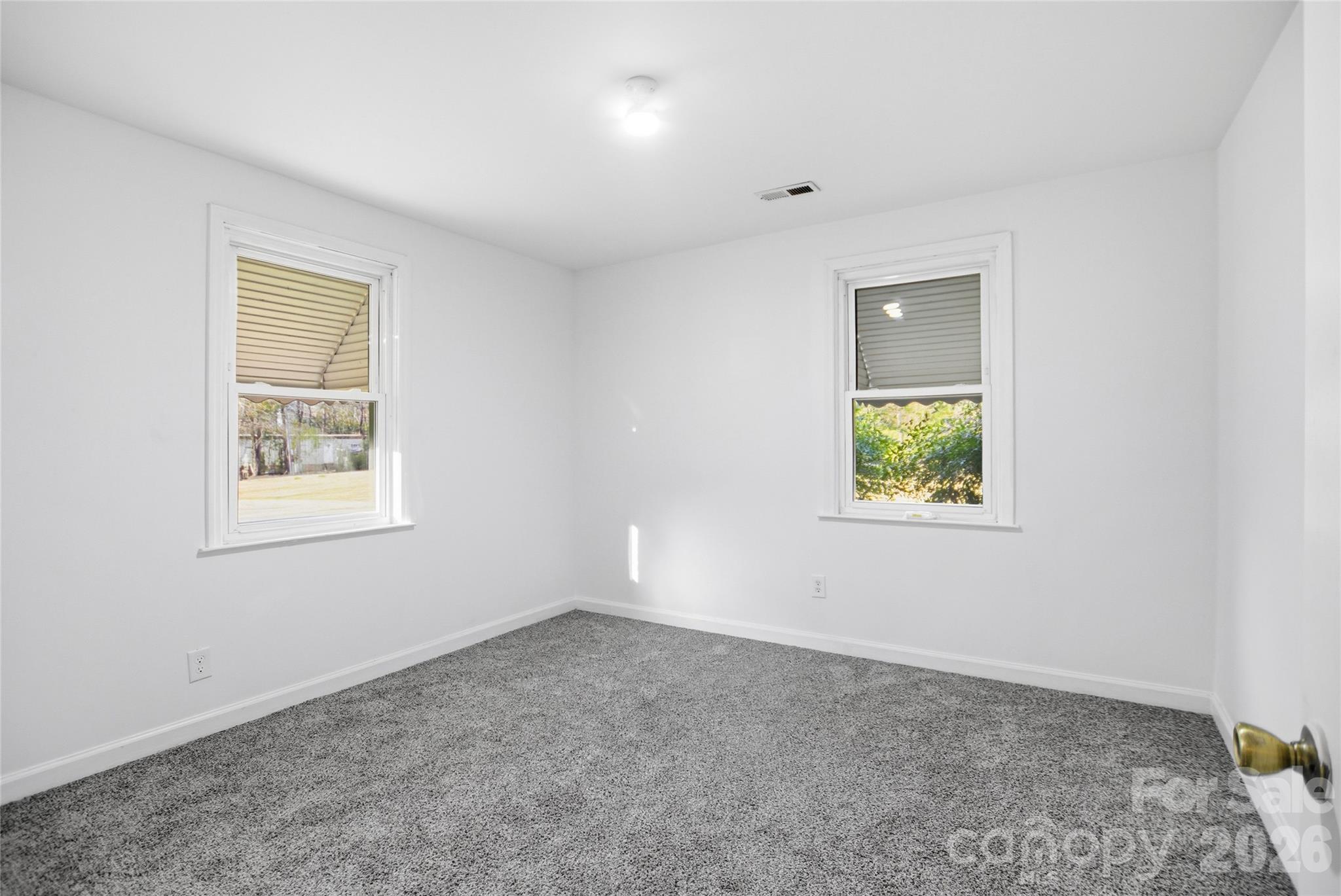 213 Jewel Street Chester, SC 29706 - Photo 12 of 21 an empty room with a window