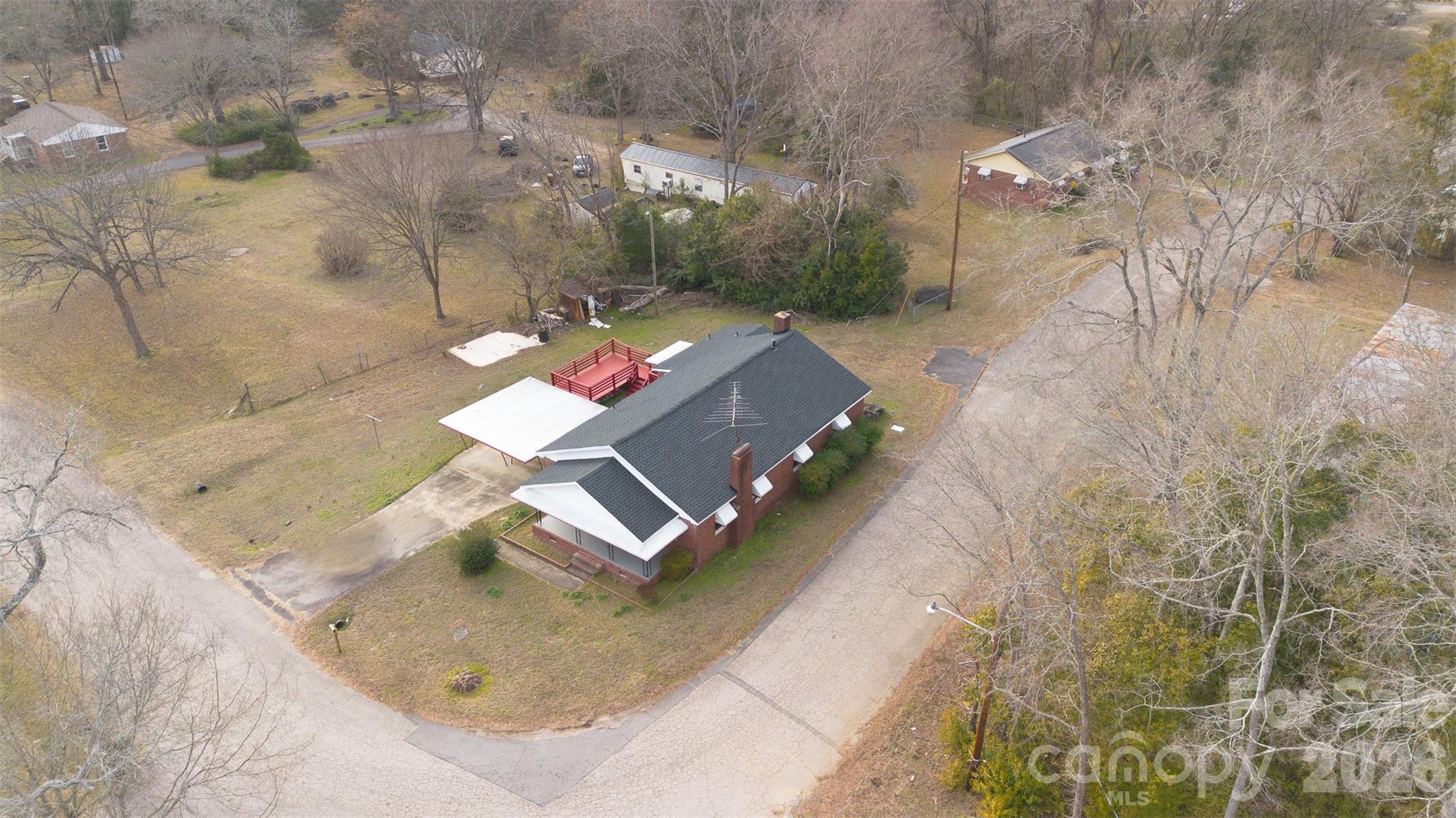 213 Jewel Street Chester, SC 29706 - Photo 20 of 21 a view of a house with a yard