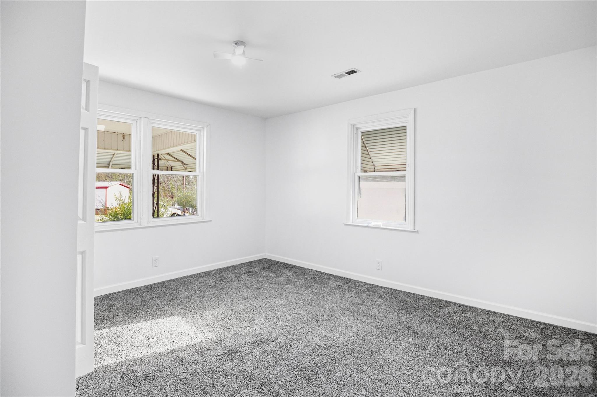 213 Jewel Street Chester, SC 29706 - Photo 6 of 21 an empty room with windows
