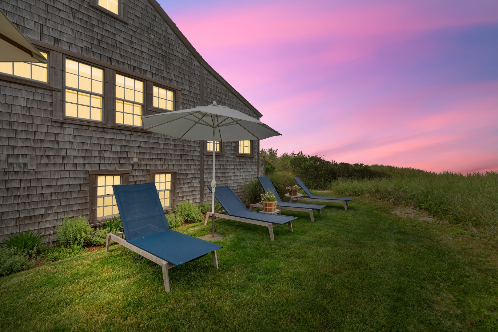 3 North Gully Road Nantucket, MA 02554 - Photo 31 of 43 a view of a chairs and table in backyard