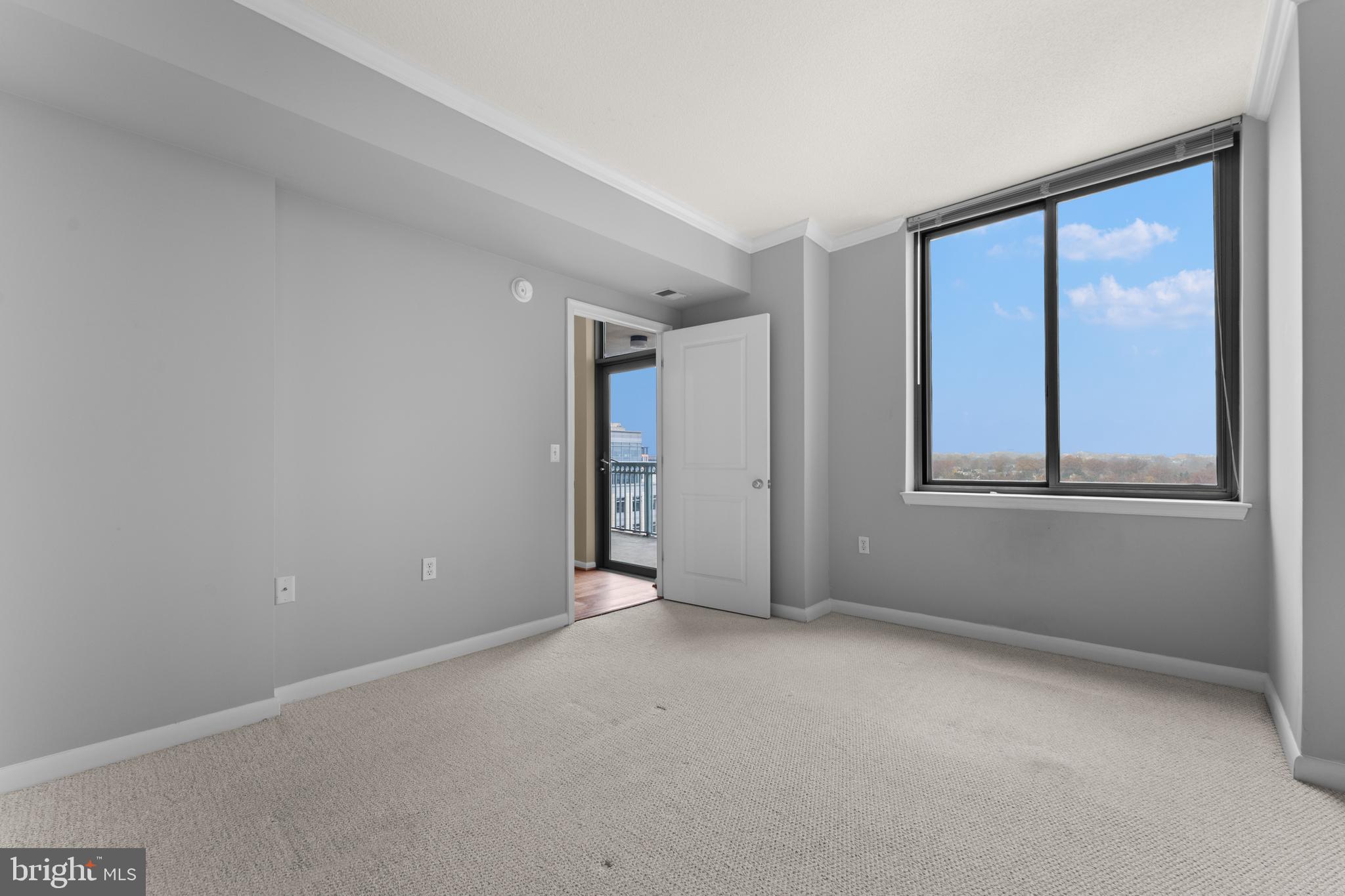 851 North Glebe Road, Unit 1514 Arlington, VA 22203 - Photo 16 of 47 a view of an empty room with a window
