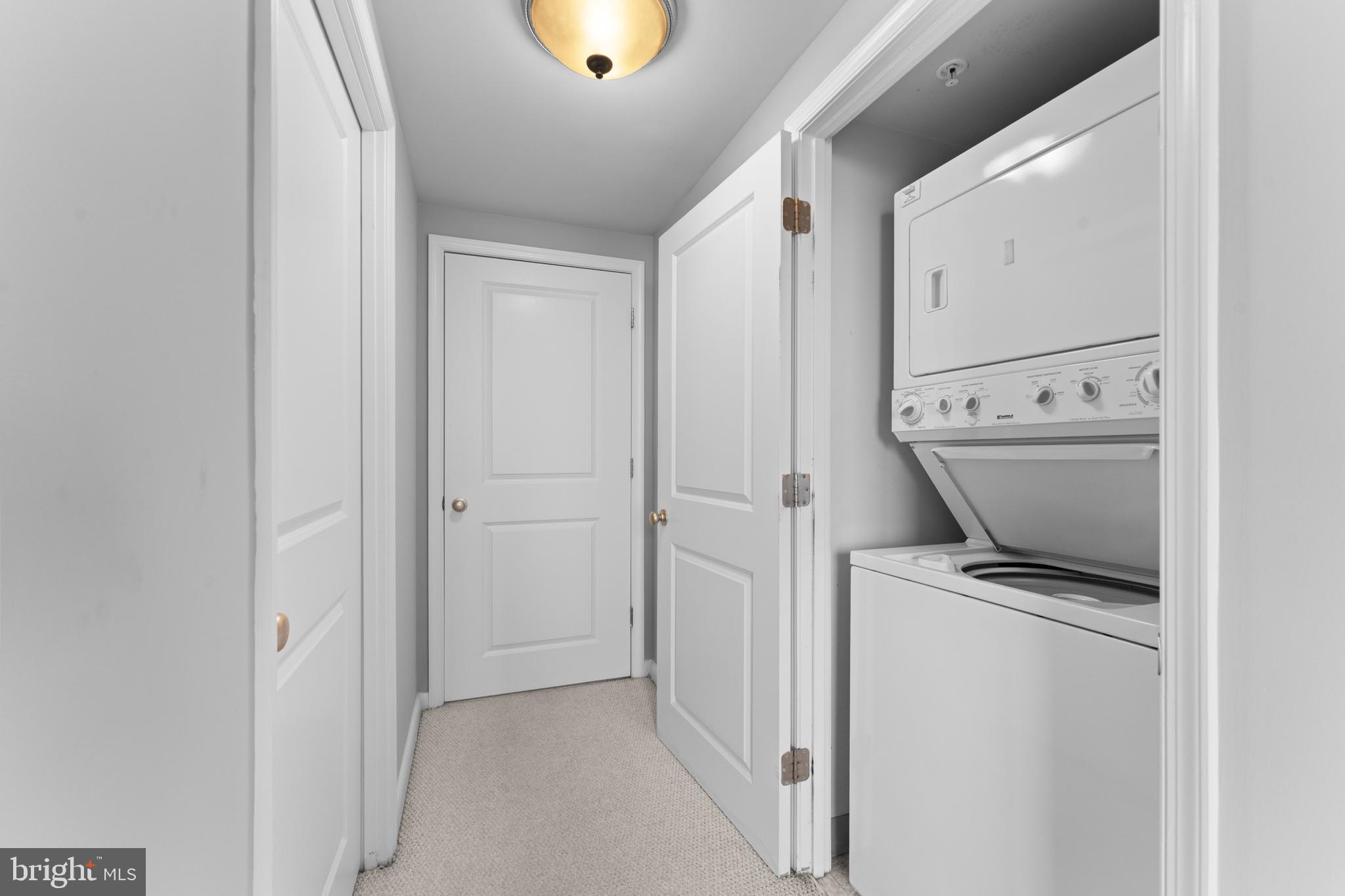 851 North Glebe Road, Unit 1514 Arlington, VA 22203 - Photo 19 of 47 a view of room with washer and dryer