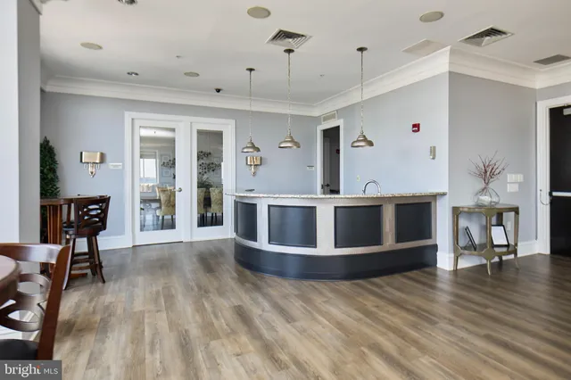 a room with furniture and wooden floor