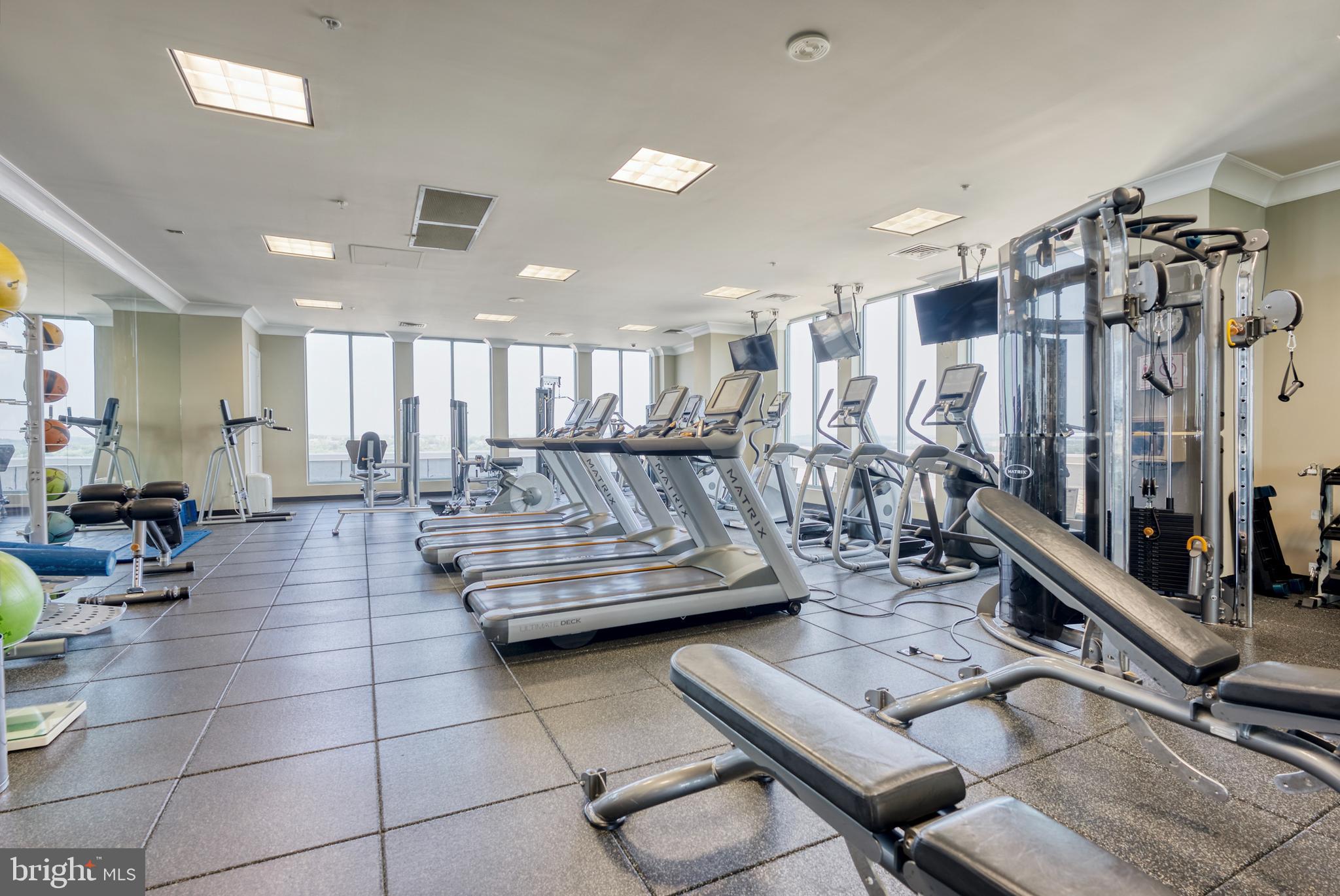 851 North Glebe Road, Unit 1514 Arlington, VA 22203 - Photo 35 of 47 a living room with lots of furniture and white walls