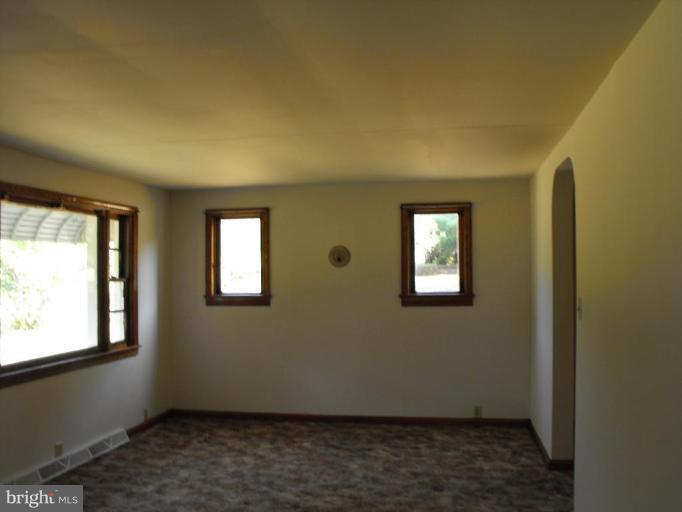 116 Paw Paw Road North Bloomery, WV 26817 - Photo 3 of 16 a view of an empty room with a window