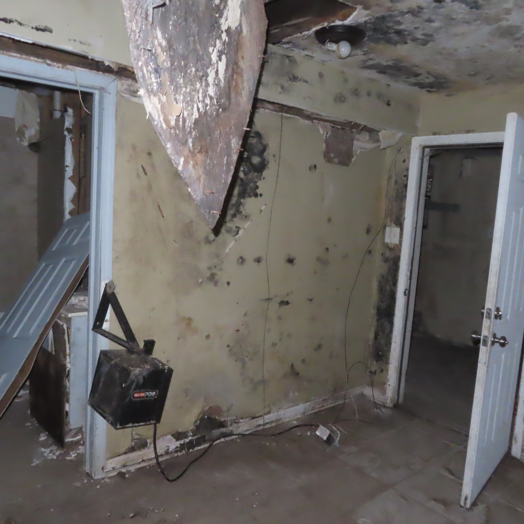 7046 South Normal Boulevard Chicago, IL 60621 - Photo 33 of 41 a bathroom with a sink and mirror