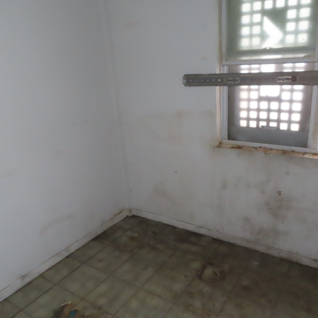 7046 South Normal Boulevard Chicago, IL 60621 - Photo 8 of 41 an empty room with a window