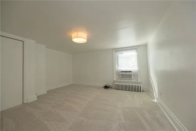 a view of entryway with livingroom