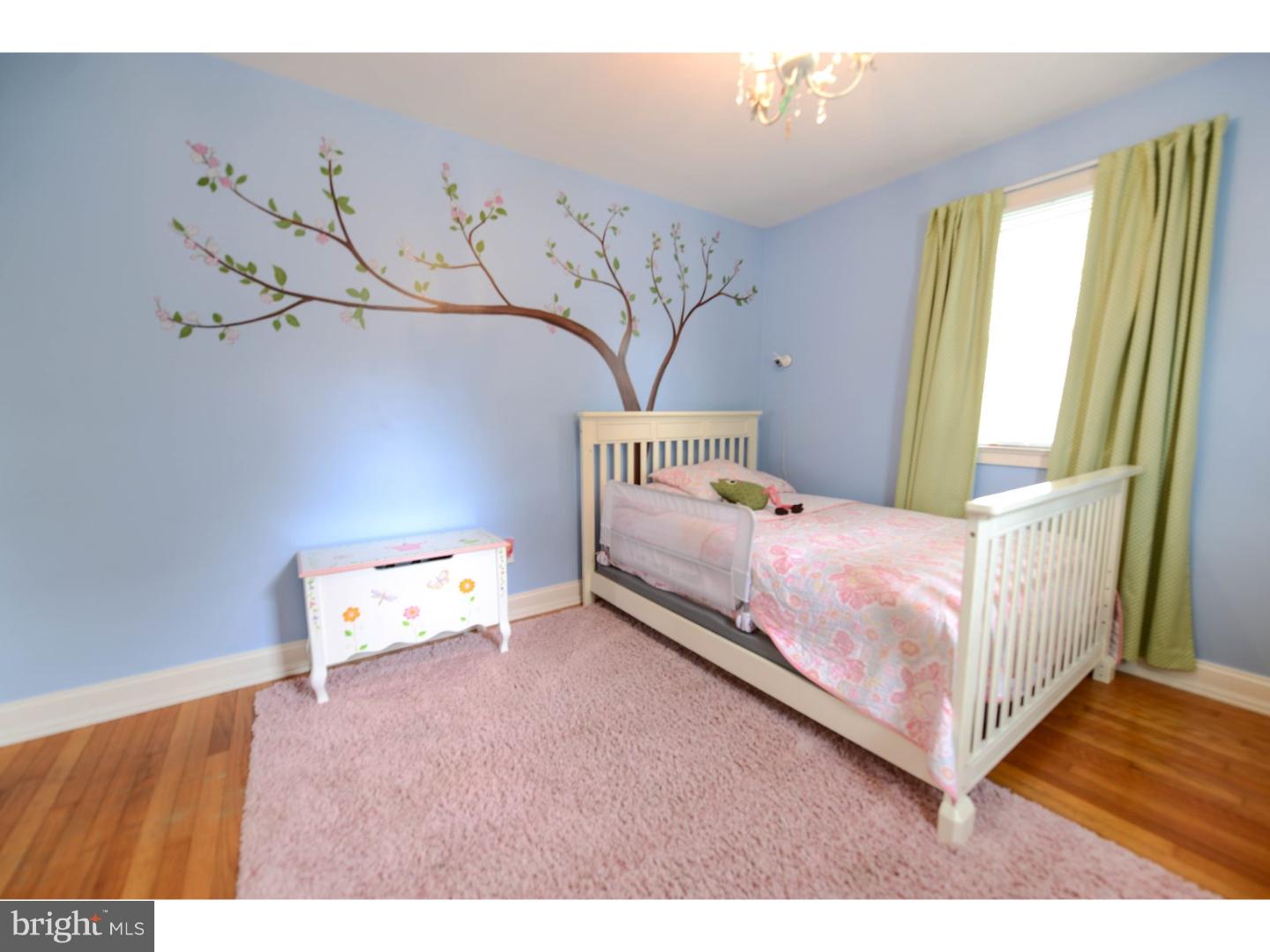 72 Kansas Road Pennsville, NJ 08070 - Photo 12 of 22 a bedroom with a bed and window