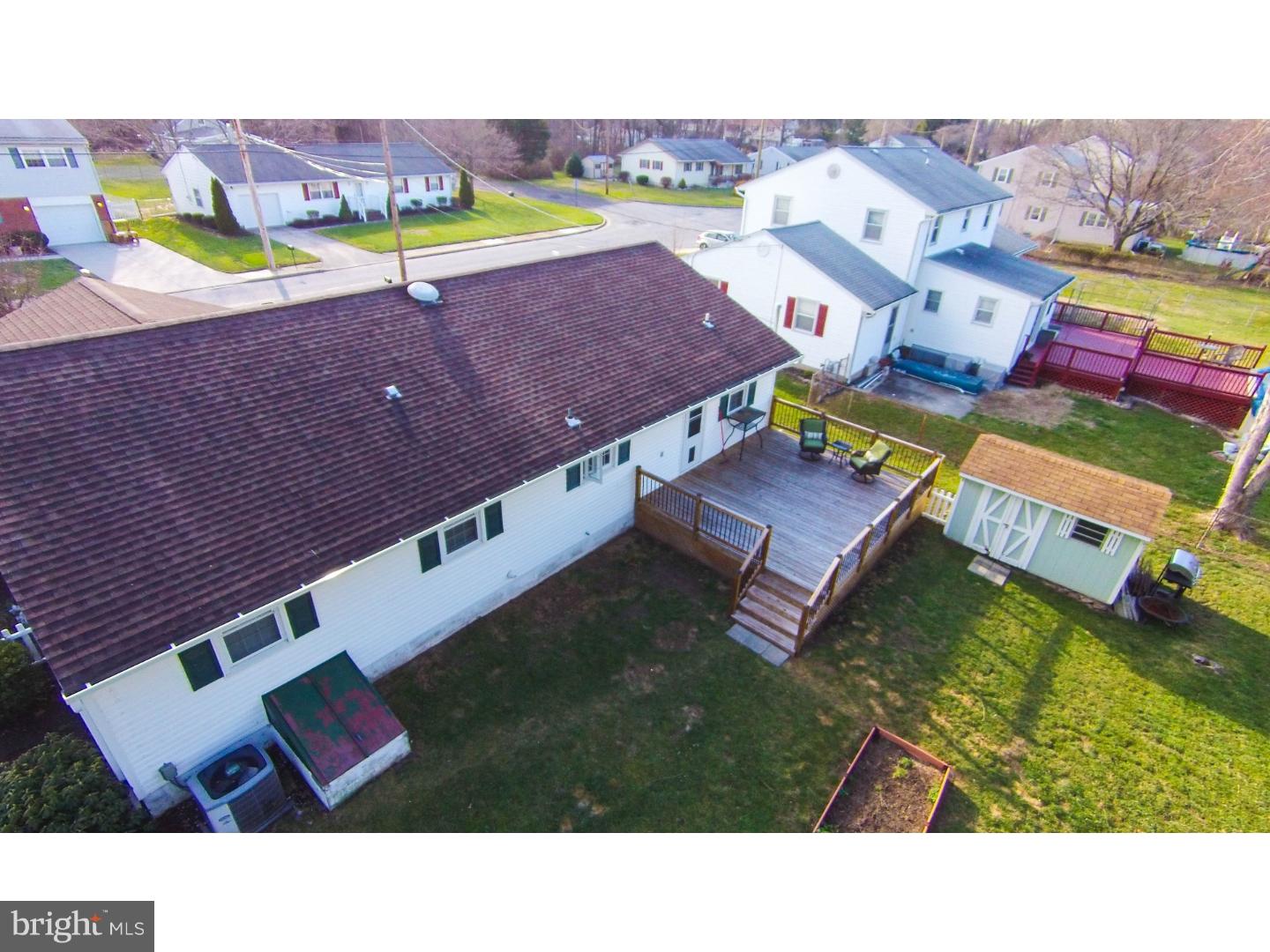 72 Kansas Road Pennsville, NJ 08070 - Photo 18 of 22 a aerial view of a house with a swimming pool
