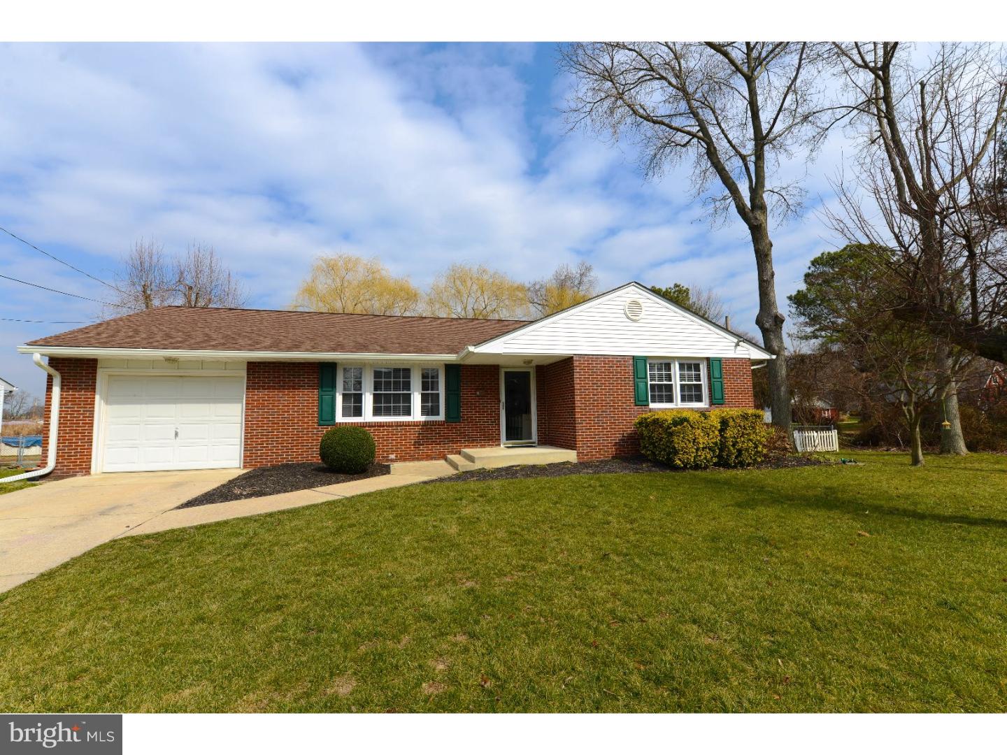 72 Kansas Road Pennsville, NJ 08070 - Photo 20 of 22 a front view of a house with garden