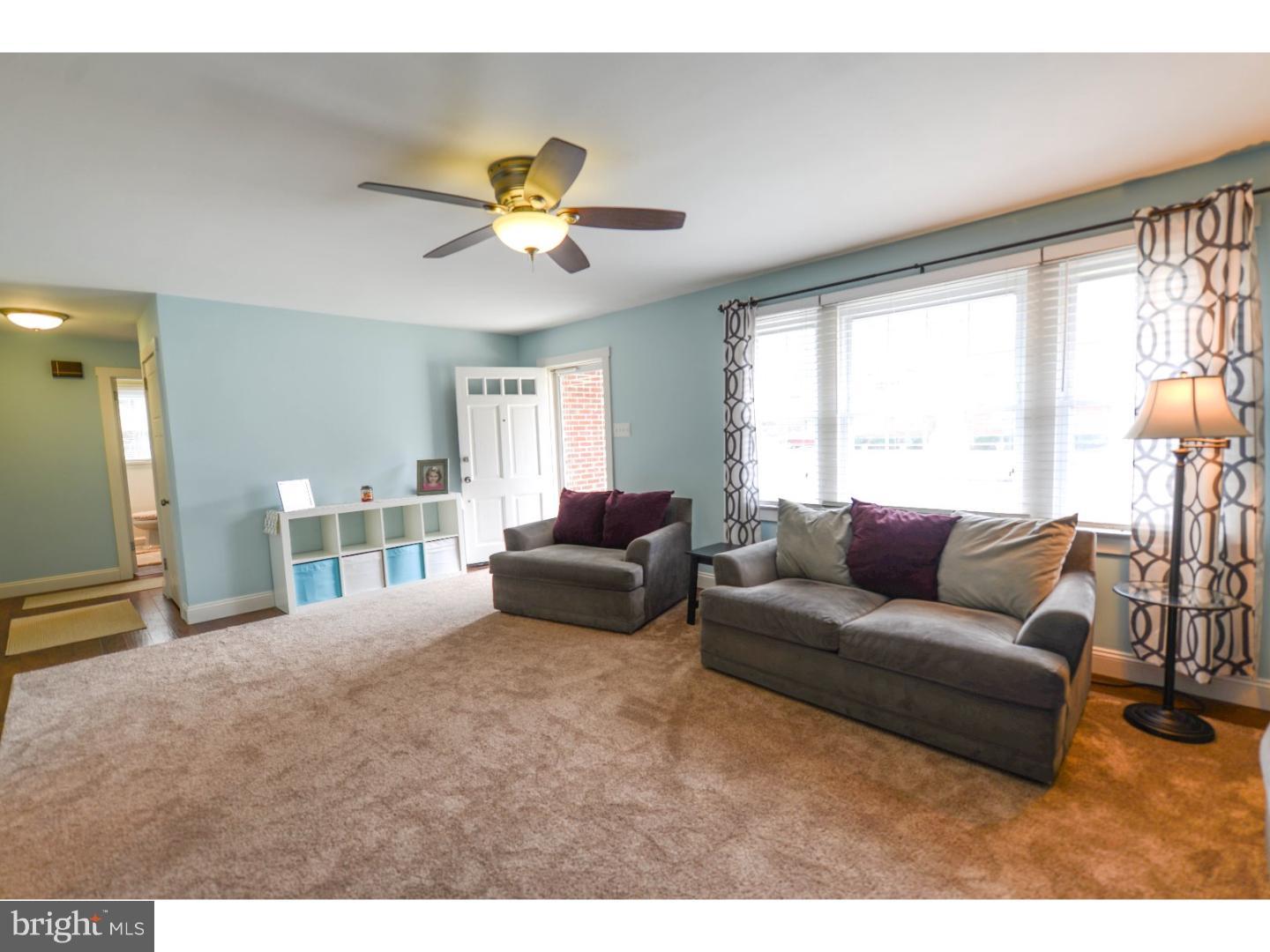 72 Kansas Road Pennsville, NJ 08070 - Photo 5 of 22 a living room with furniture and a large window