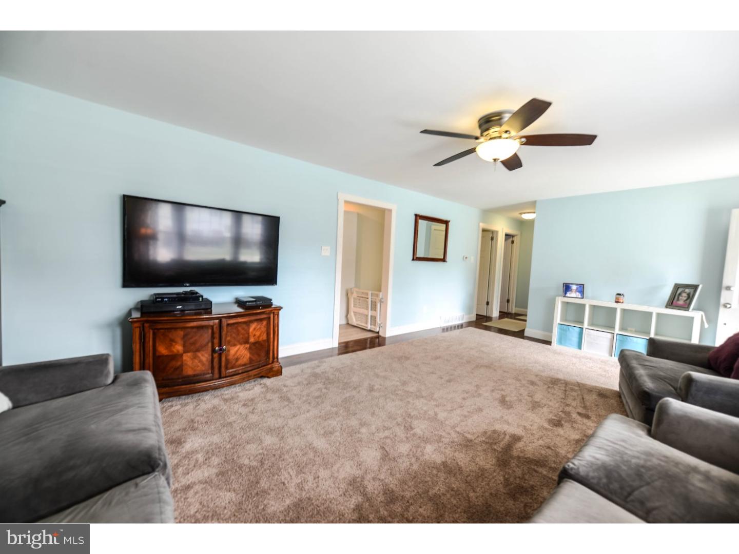 72 Kansas Road Pennsville, NJ 08070 - Photo 6 of 22 a living room with furniture and a flat screen tv