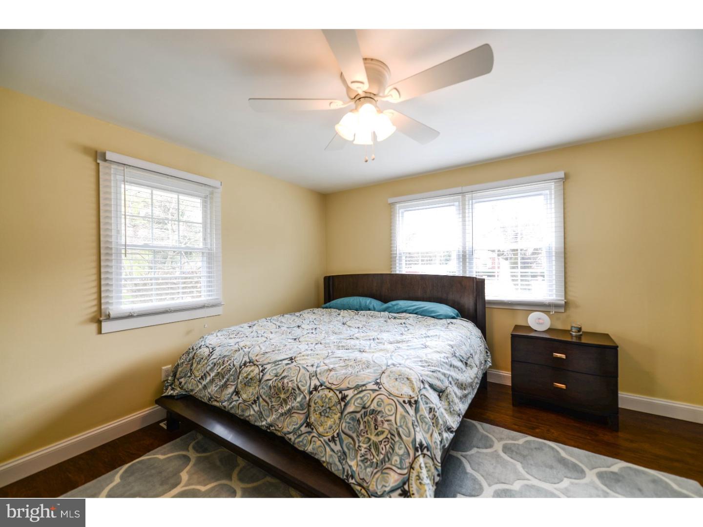 72 Kansas Road Pennsville, NJ 08070 - Photo 8 of 22 a bedroom with a bed and a window