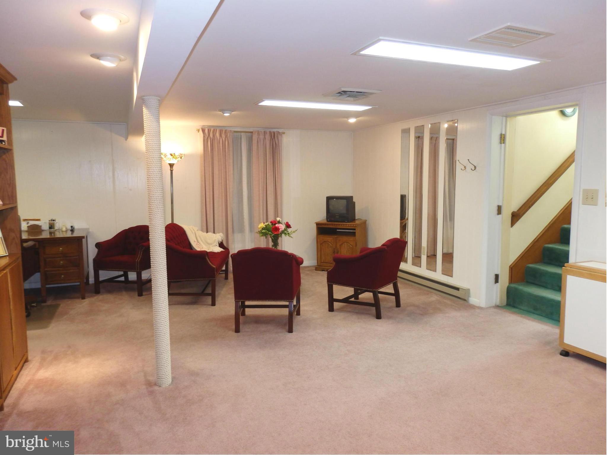 7940 Edgewood Farm Road Frederick, MD 21702 - Photo 22 of 30 Lower level has large L shaped rec room