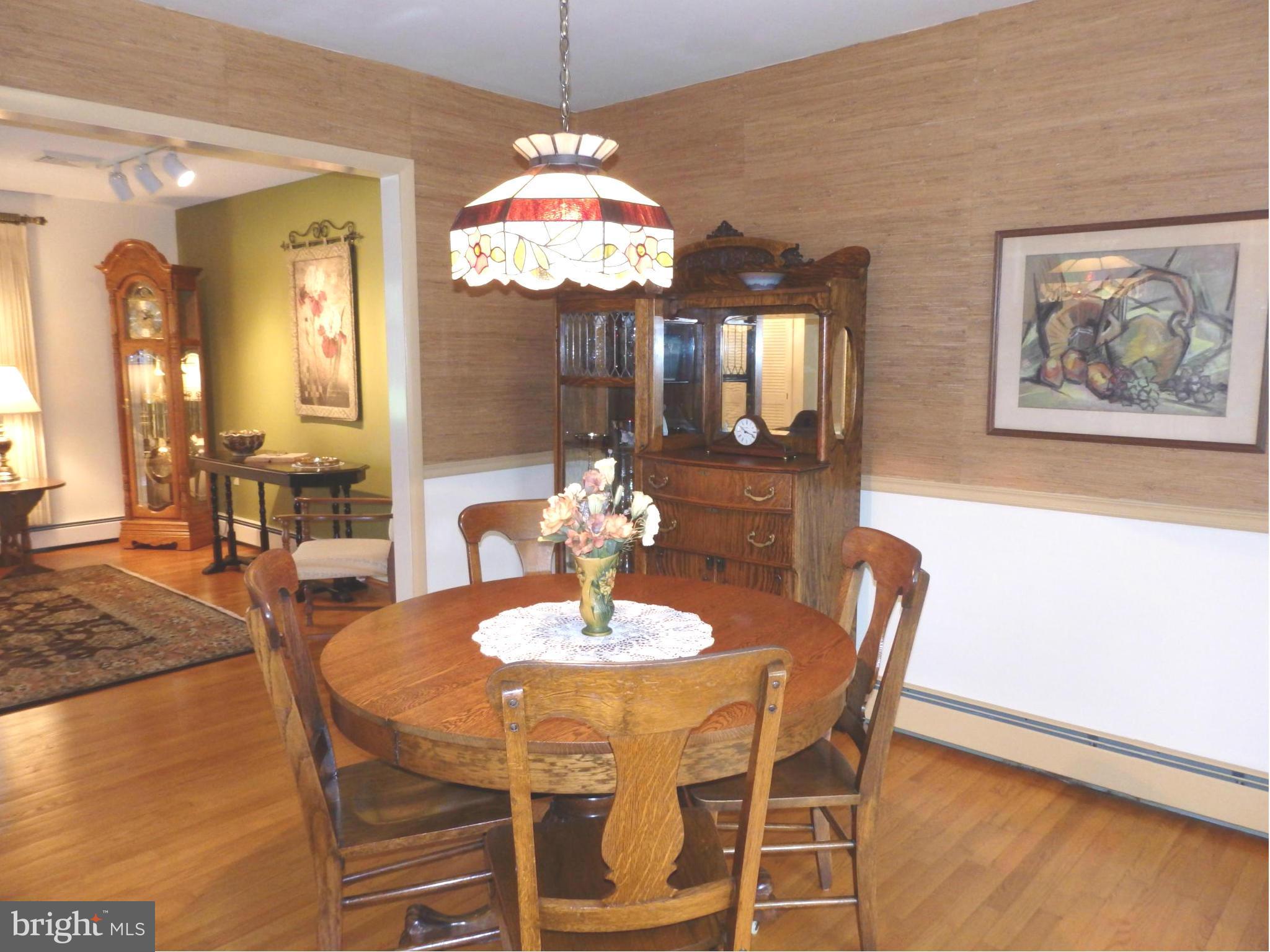 7940 Edgewood Farm Road Frederick, MD 21702 - Photo 4 of 30 Dining Room has chandelier and chair rail molding