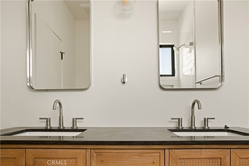 2671 1/2 Benedict Street Los Angeles, CA 90039 - Photo 20 of 39 a bathroom with a sink and a mirror