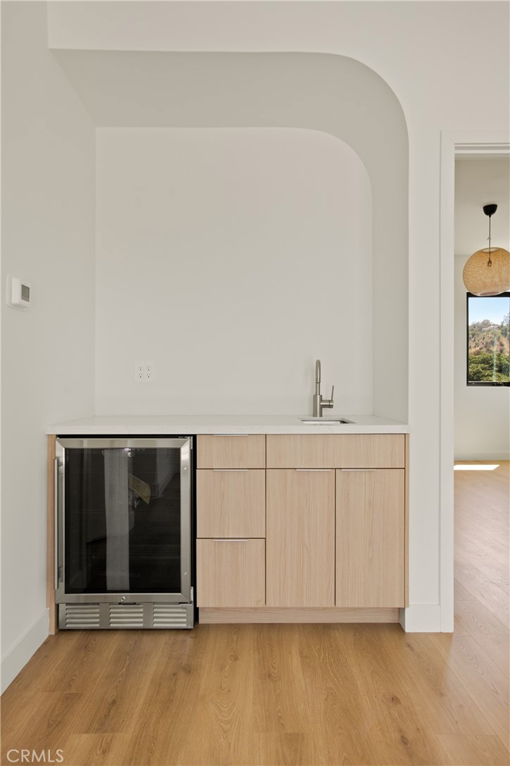 2671 1/2 Benedict Street Los Angeles, CA 90039 - Photo 26 of 39 a view of an empty room with cabinet and a window