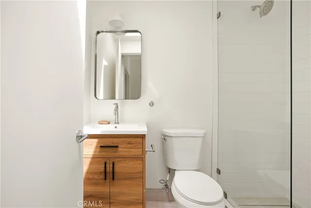 a bathroom with a toilet a sink and a bathtub