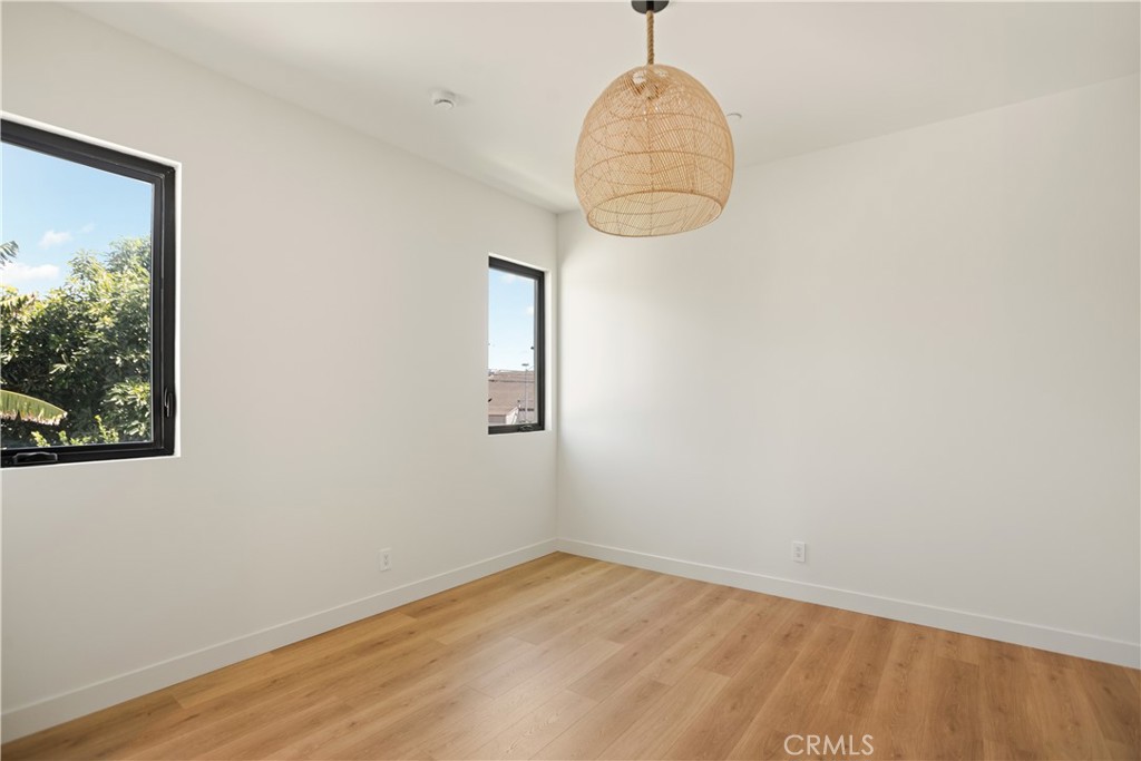 2671 1/2 Benedict Street Los Angeles, CA 90039 - Photo 5 of 39 a decorative lighting & window in a room