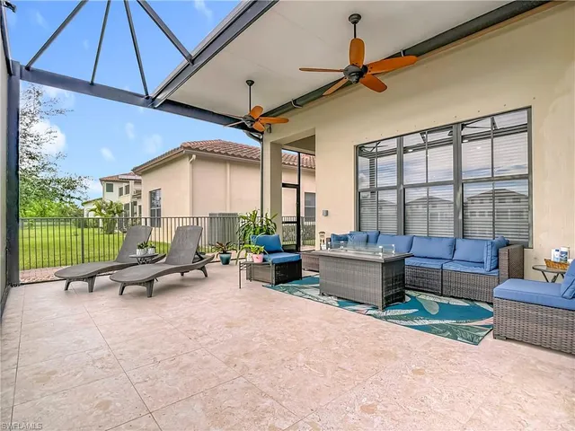 a outdoor space with the couches and deck