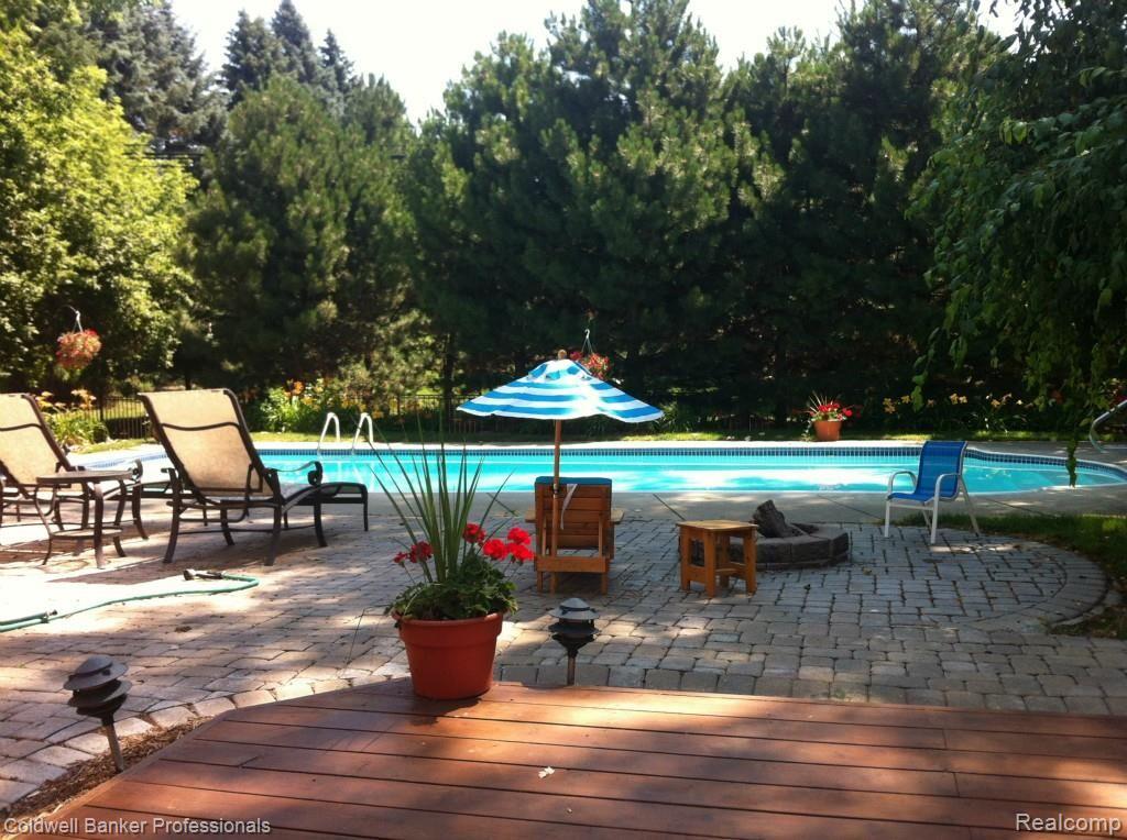 1551 Crooks Road Rochester, MI 48309 - Photo 5 of 33 Beautiful In-ground Pool with Brick Paver and Deck.