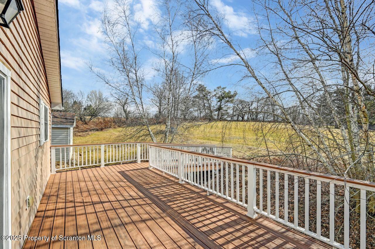 41 Show Kase Road Forest City, PA 18421 - Photo 44 of 81 a view of a balcony with wooden floor