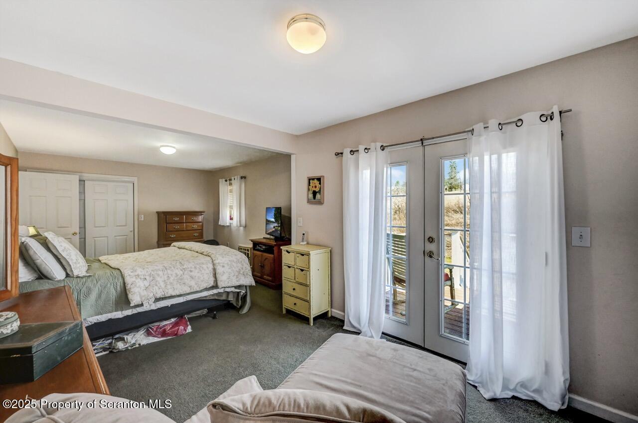 41 Show Kase Road Forest City, PA 18421 - Photo 47 of 81 a bed room with a bed and a lamp