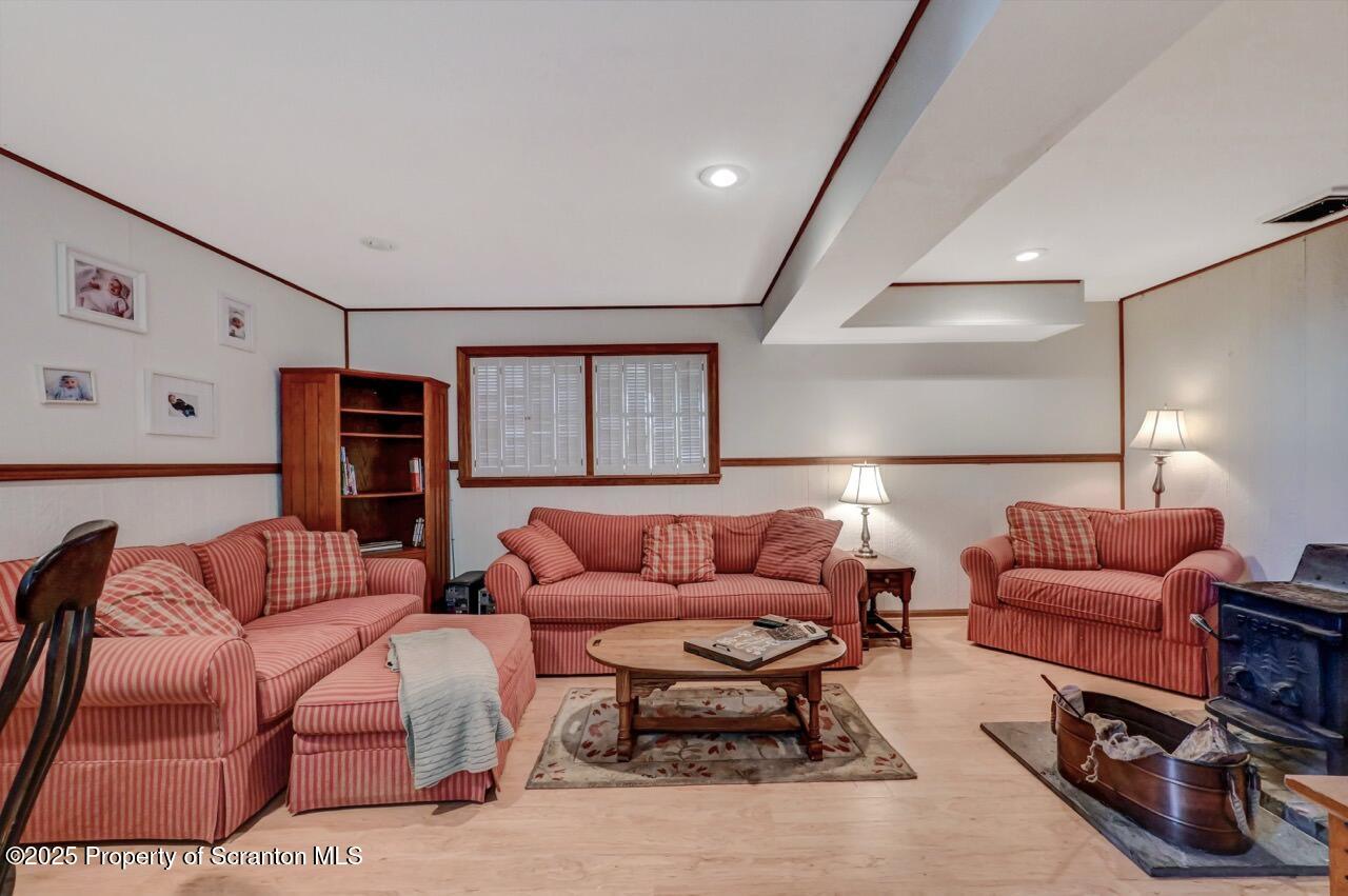 41 Show Kase Road Forest City, PA 18421 - Photo 59 of 81 a living room with furniture a ceiling fan and a rug