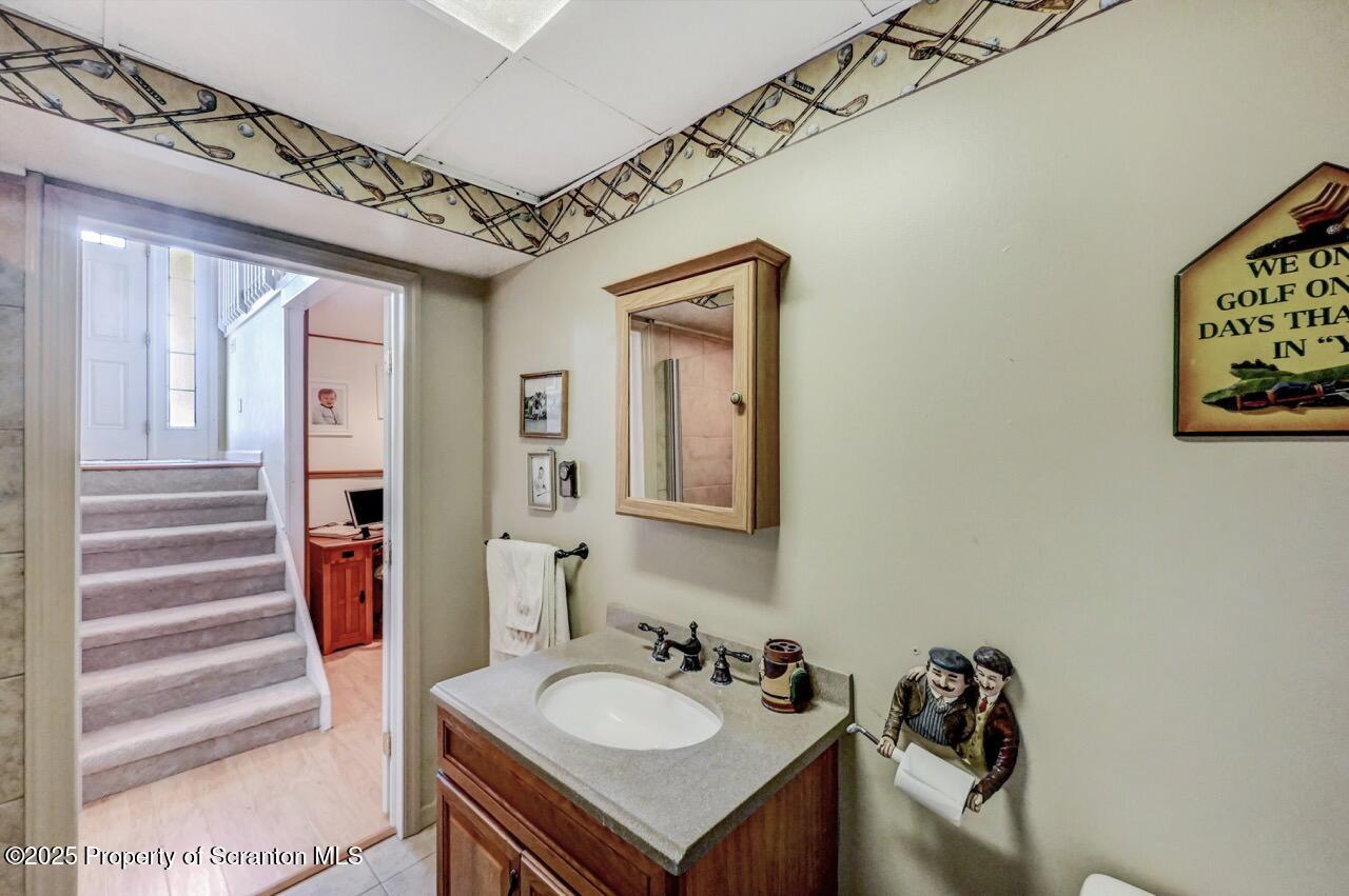 41 Show Kase Road Forest City, PA 18421 - Photo 63 of 81 a bathroom with a sink and a mirror