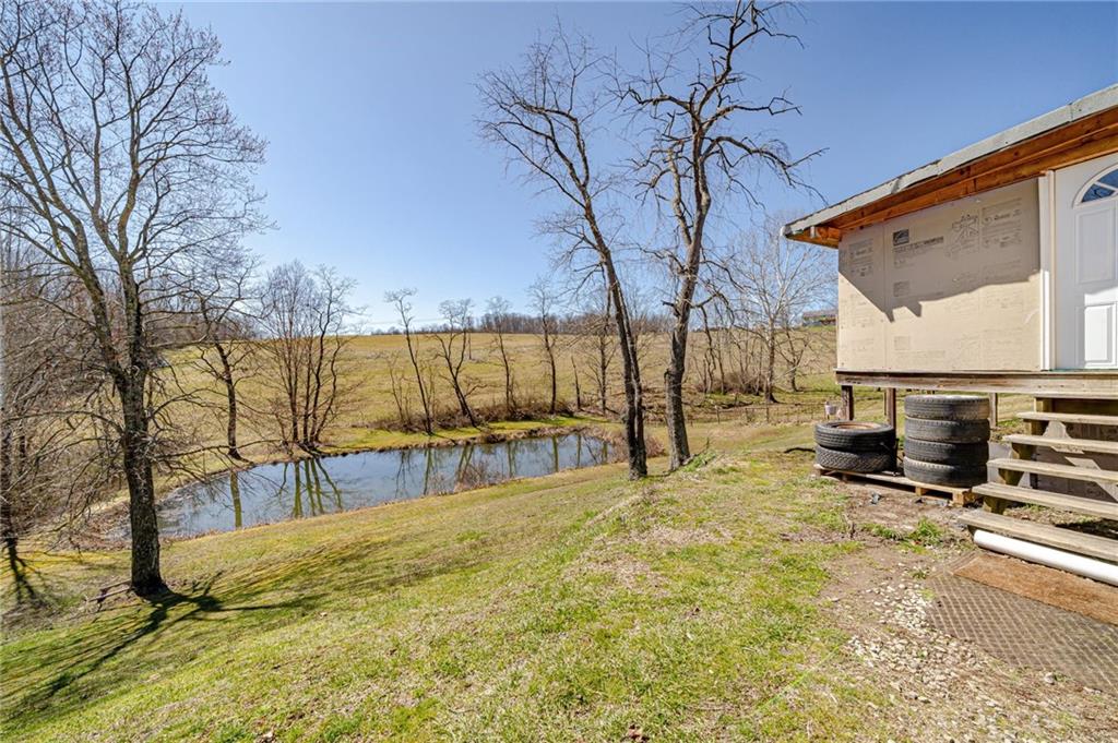 342 Little Summit Road Dunbar, PA 15431 - Photo 3 of 23 a view of a swimming pool with a patio