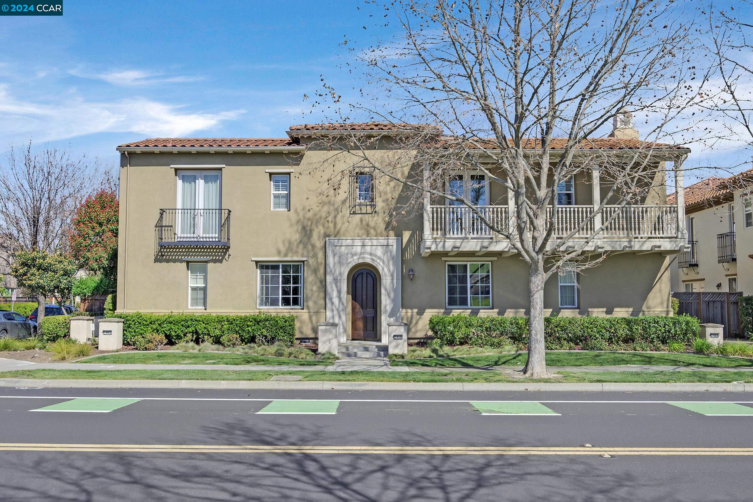 7458 Stoneleaf Road San Ramon, CA 94582 - Photo 1 of 1 a front view of a house with a garden and plants