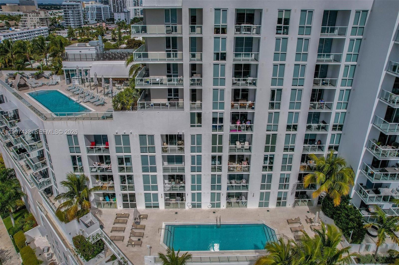 401 North Birch Road, Unit 404 Fort Lauderdale, FL 33304 - Photo 15 of 39 a front view of a building with balcony