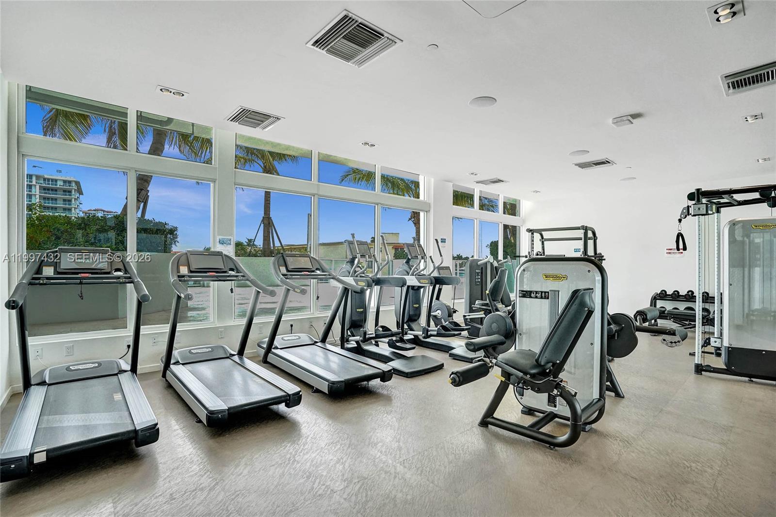 401 North Birch Road, Unit 404 Fort Lauderdale, FL 33304 - Photo 30 of 39 a view of a room with gym equipment