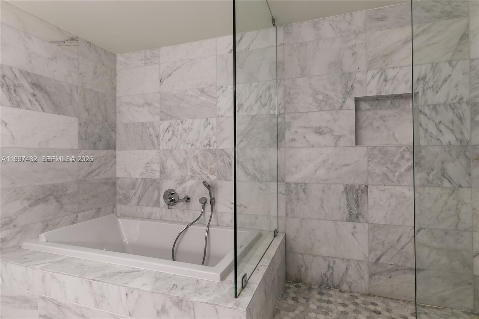 401 North Birch Road, Unit 404 Fort Lauderdale, FL 33304 - Photo 7 of 39 a bathroom with a shower