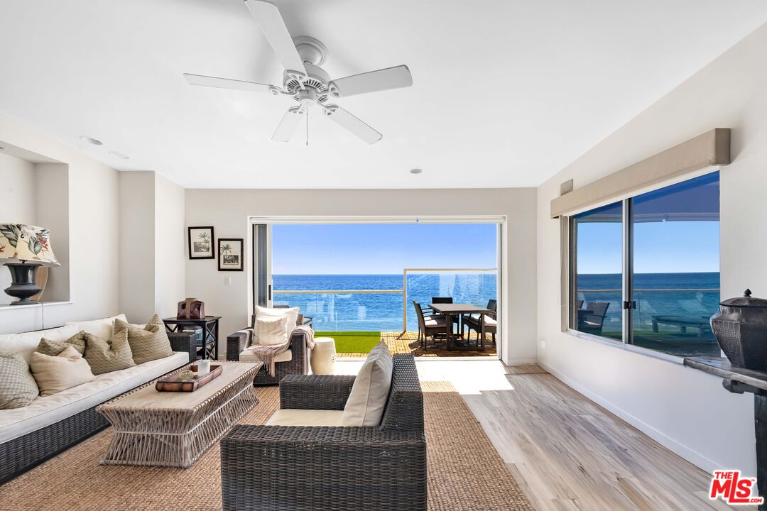 25444 Malibu Road Malibu, CA 90265 - Photo 2 of 15 a living room with furniture and a large window