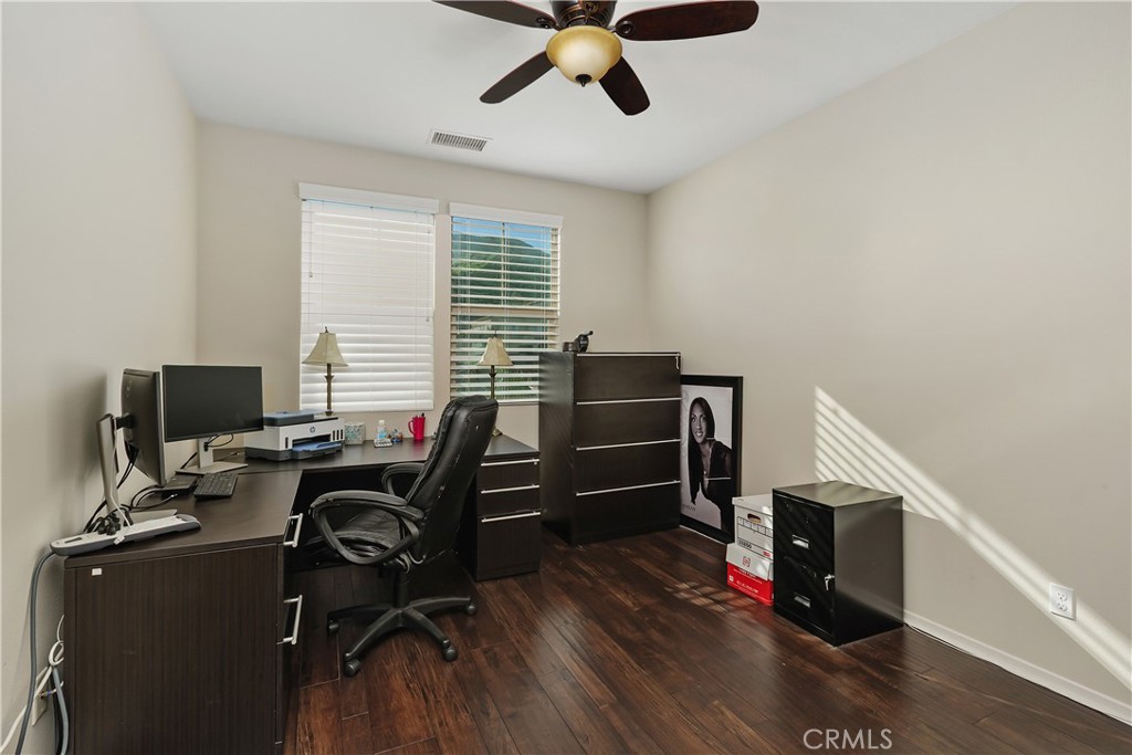 24128 Deputy Way Menifee, CA 92584 - Photo 25 of 34 a workspace with furniture hardwood and a window