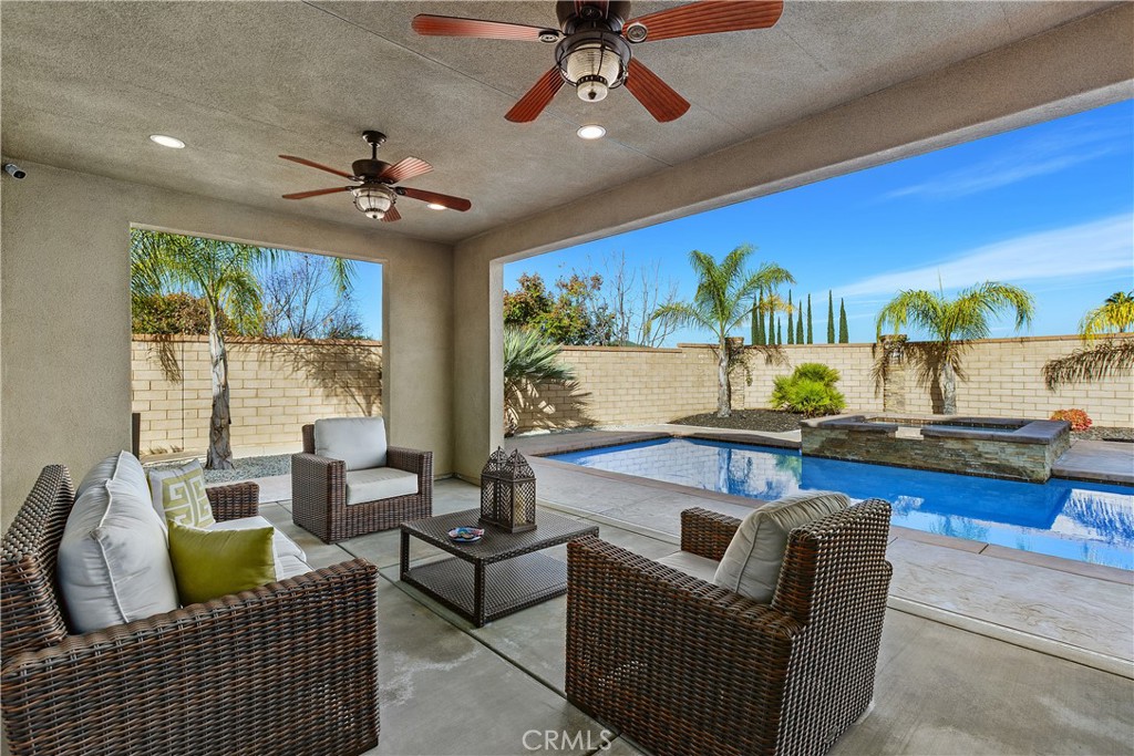 24128 Deputy Way Menifee, CA 92584 - Photo 26 of 34 a living room with furniture and a large window