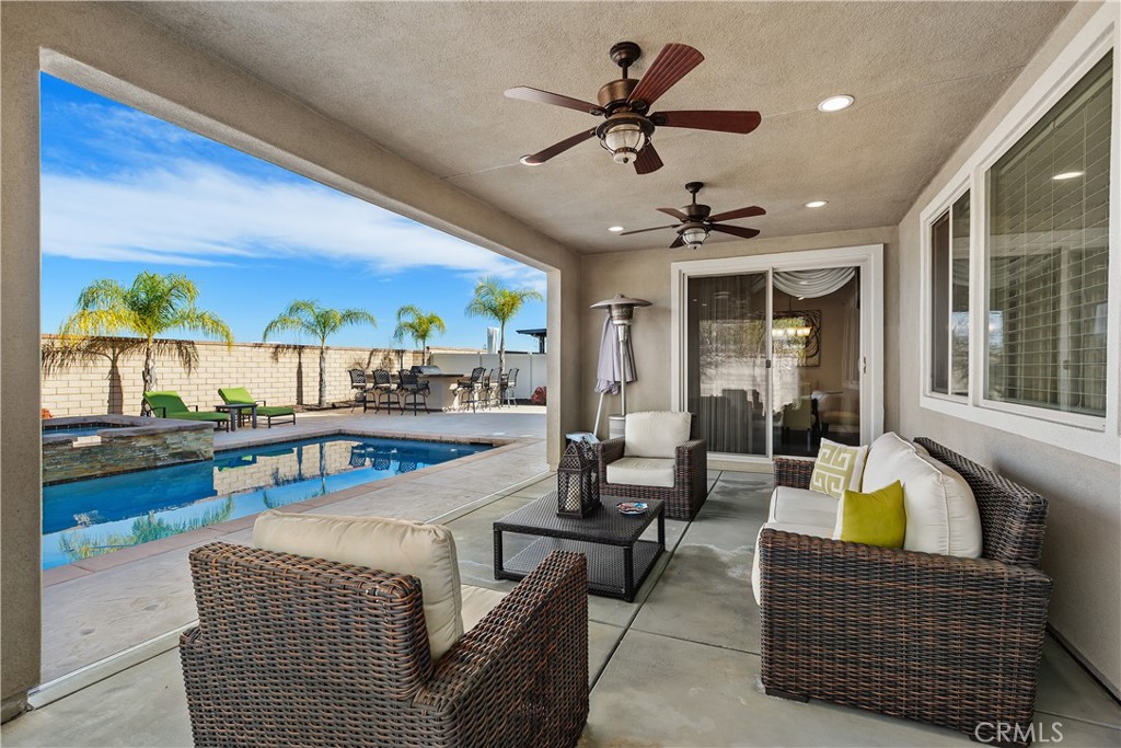 24128 Deputy Way Menifee, CA 92584 - Photo 27 of 34 a living room with furniture and a large window