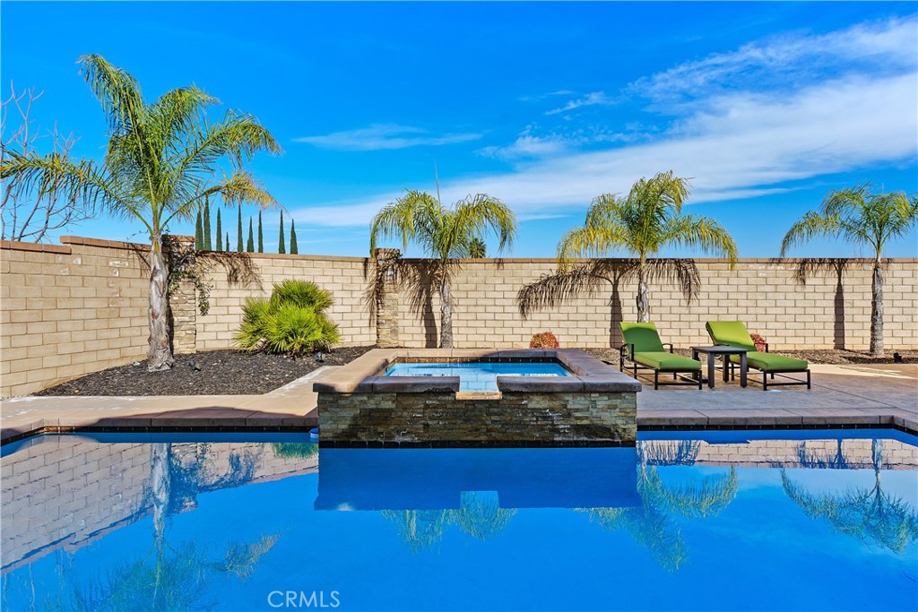 24128 Deputy Way Menifee, CA 92584 - Photo 30 of 34 a swimming pool view with a seating space